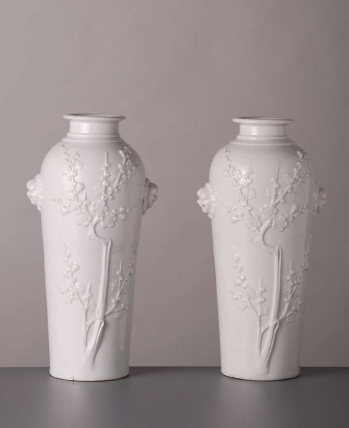 Pair of Blanc de Chine Vasesw lionmask handles